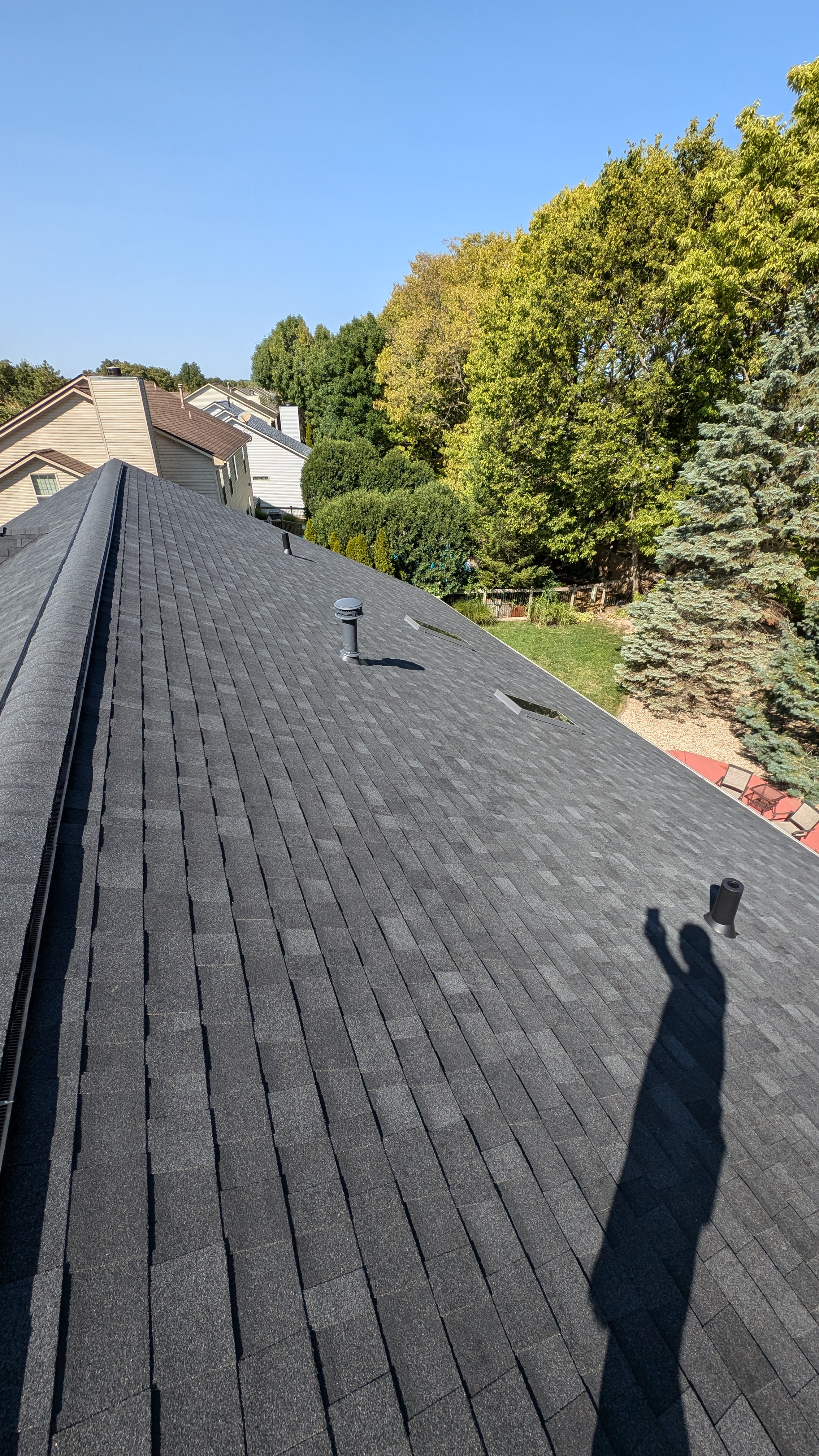 Close-up view of high-quality dark architectural shingle installation